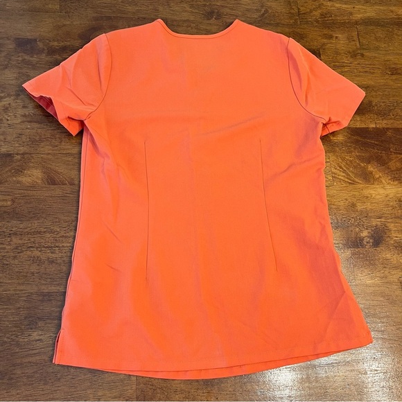 Figs Orange v neck top size XS PO# 2525 - Picture 7 of 9